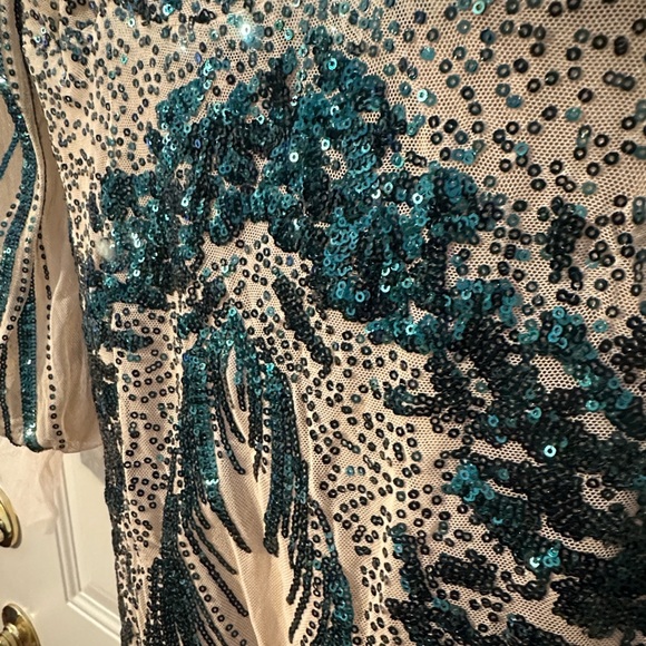 Elegant Sheer Illusion Gown with Teal Sequin Accents - Picture 7 of 11